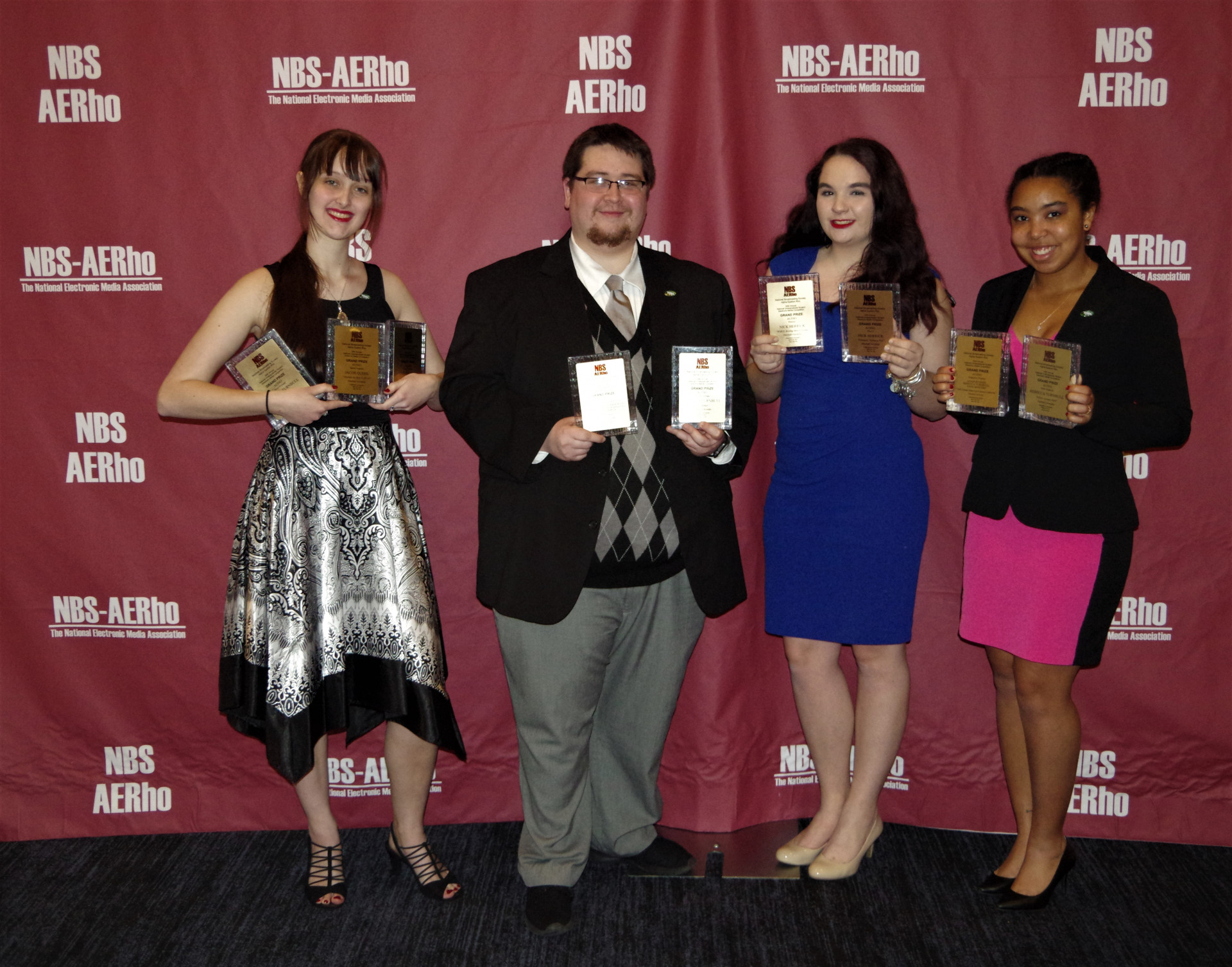 NBS-AERho award recipients pictured from left to right are: Monica Zalaznik (Online Director), Adam Rogers (Executive Director), Kyra Biscarner (News Director) and Sage Shavers (Traffic Director).