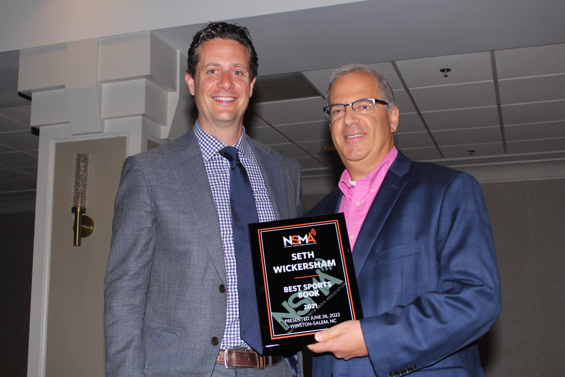 Seth Wickersham (left) accepts 2021 Book of the Year Award from Dave Goren (Daniel Coston Photo)