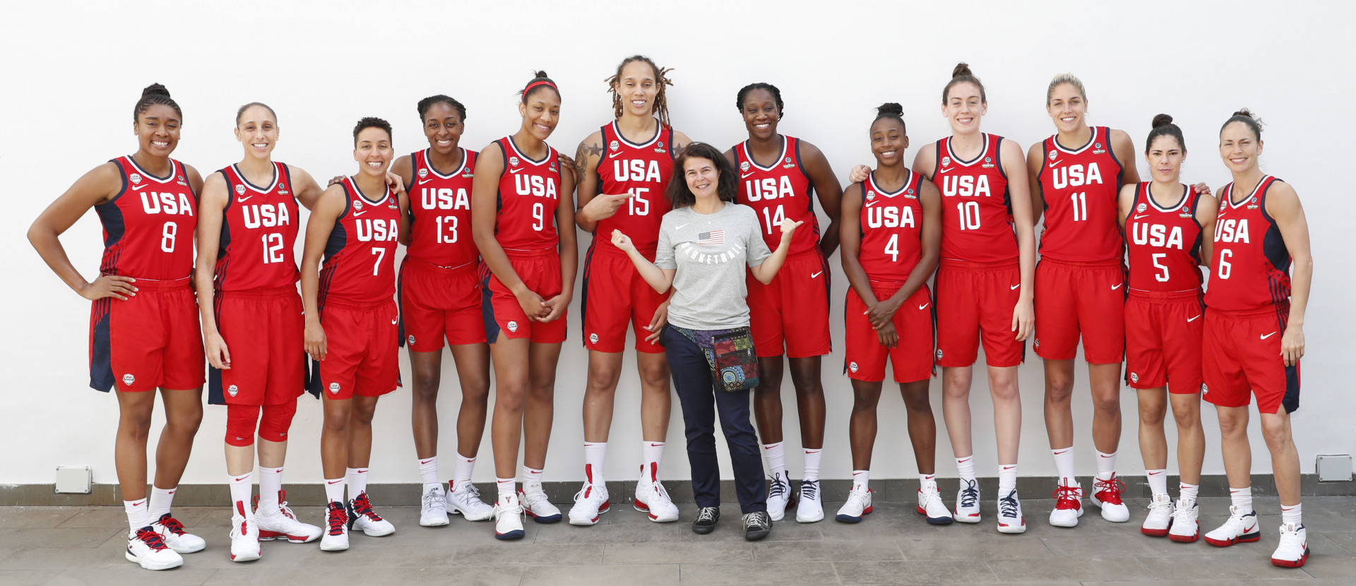Longtime NSMA/AIPS member Catherine Steenkeste (front) was selected as the official photographer for Team USA for the recently-completed FIBA World Cup, won the Americans